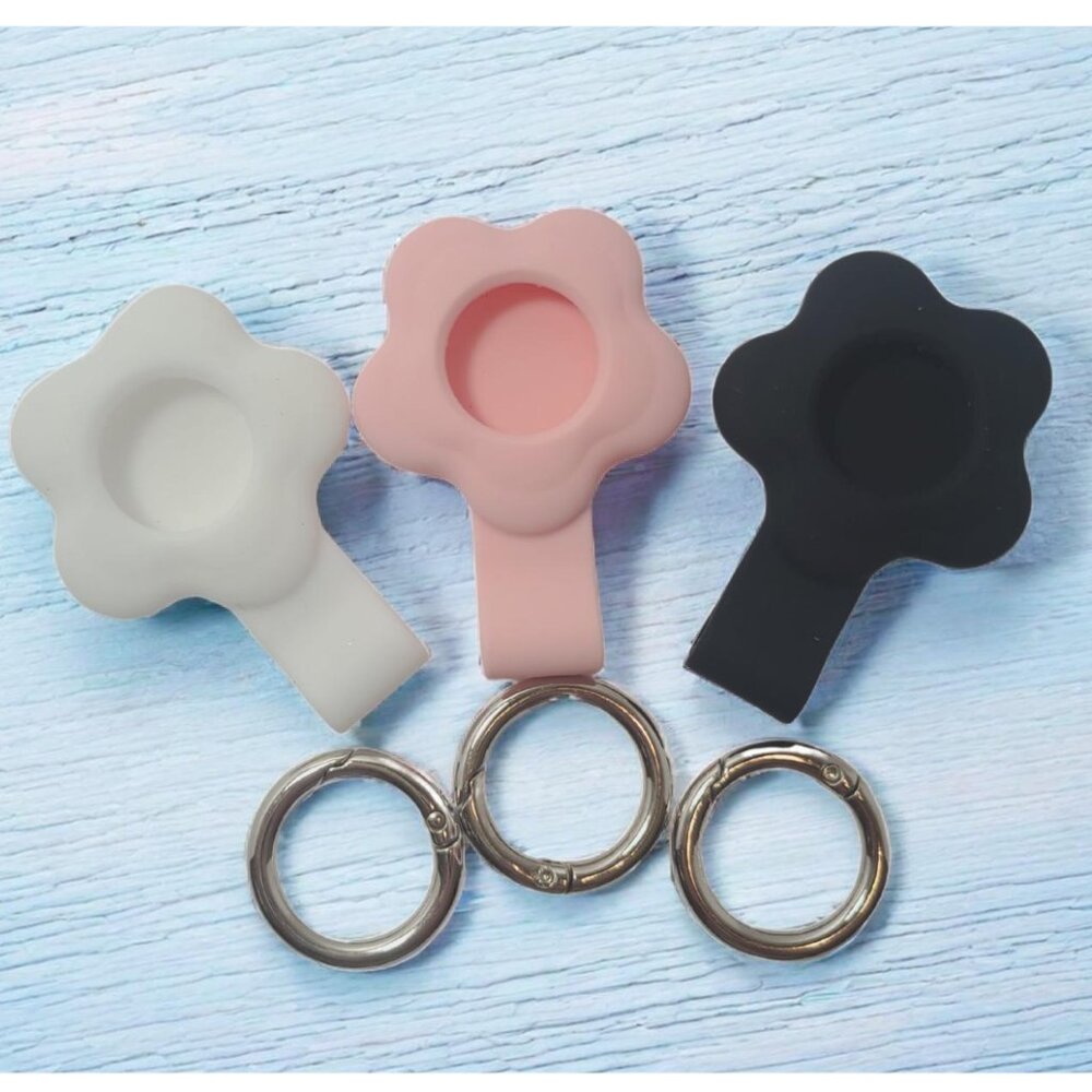 Pack Floral Silicone AirTag Holders – White, Pink, Black – Open Package